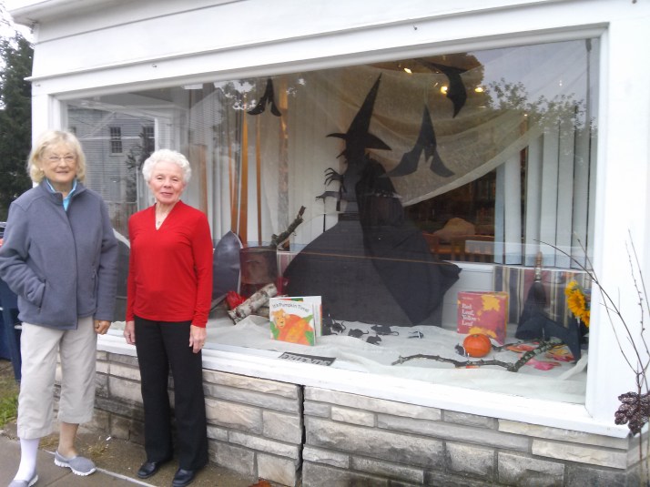 Brenda, Vivian and Janet decorate the Pine Plains Library window for Halloween. Join us for our book distribution October 31st at the PP firehouse.
