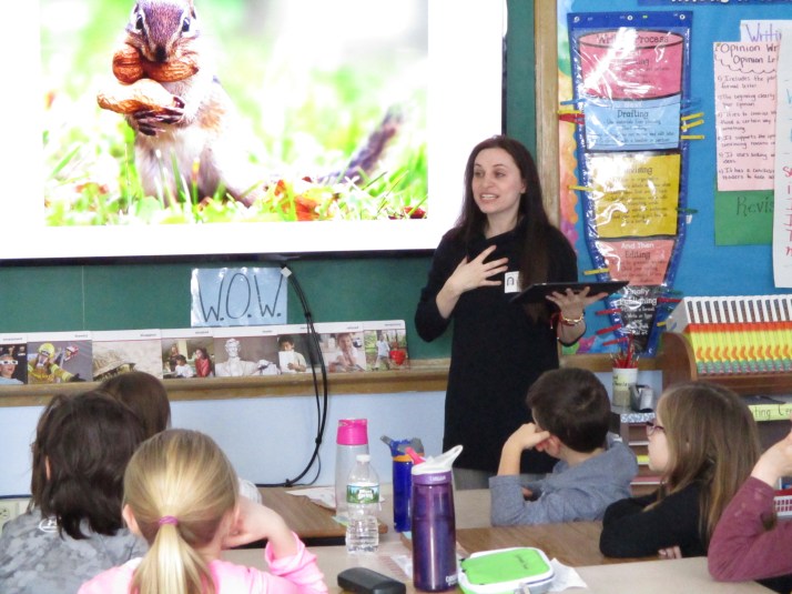 Courtney Scheinmel, author of the Kindness Club series, explains to third graders from Seymour Smith Intermediate Learning Center, what it means to be an author. Students also participated in a kindness writing activity with the author.